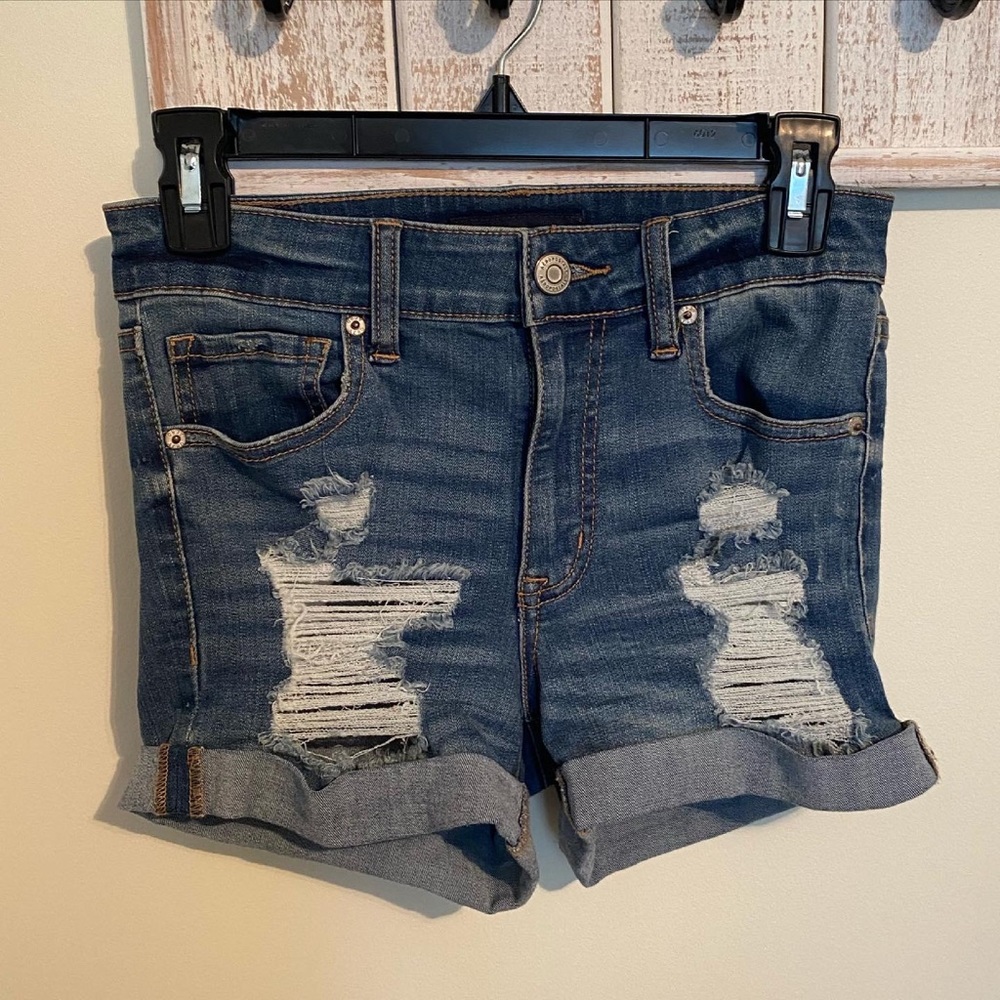 ripped blue jean shorts